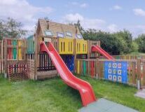 grass, sky, outdoor, outdoor play equipment, playground slide